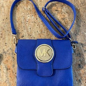 Blue with gold MK cross body or wristlet purse